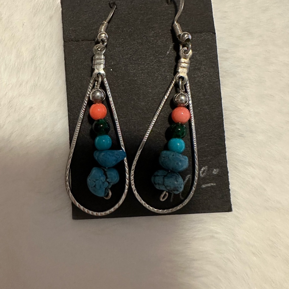 New sterling silver earring’s turquoise and coral.